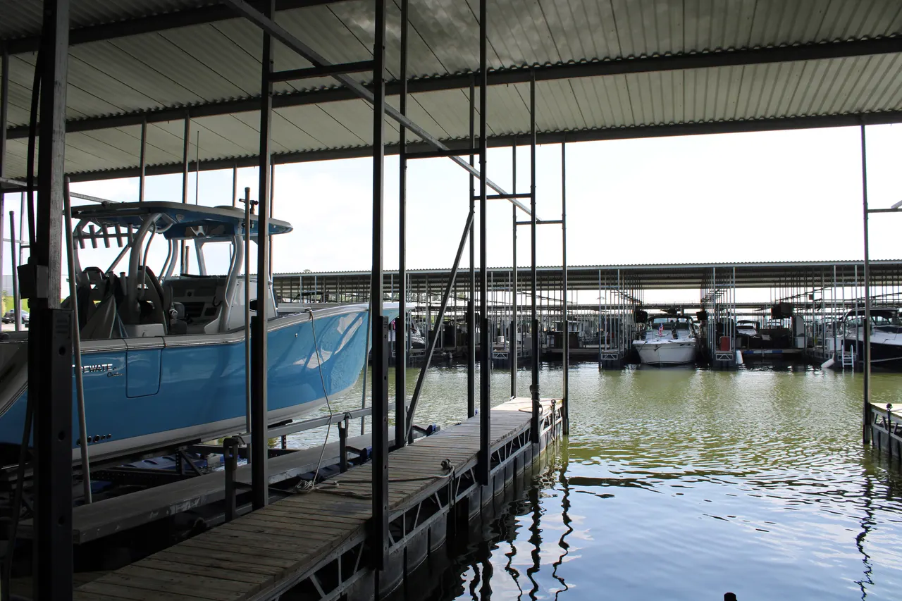 A boat in its covered slip on D Dock
