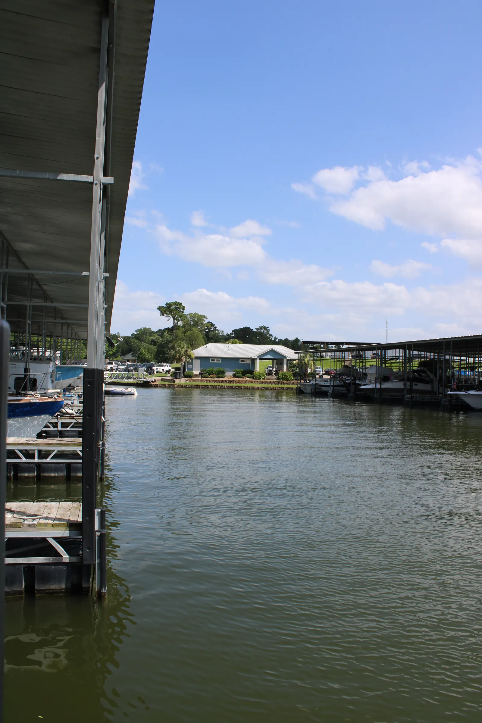 The covered slips of D Dock at The Palms Marina
