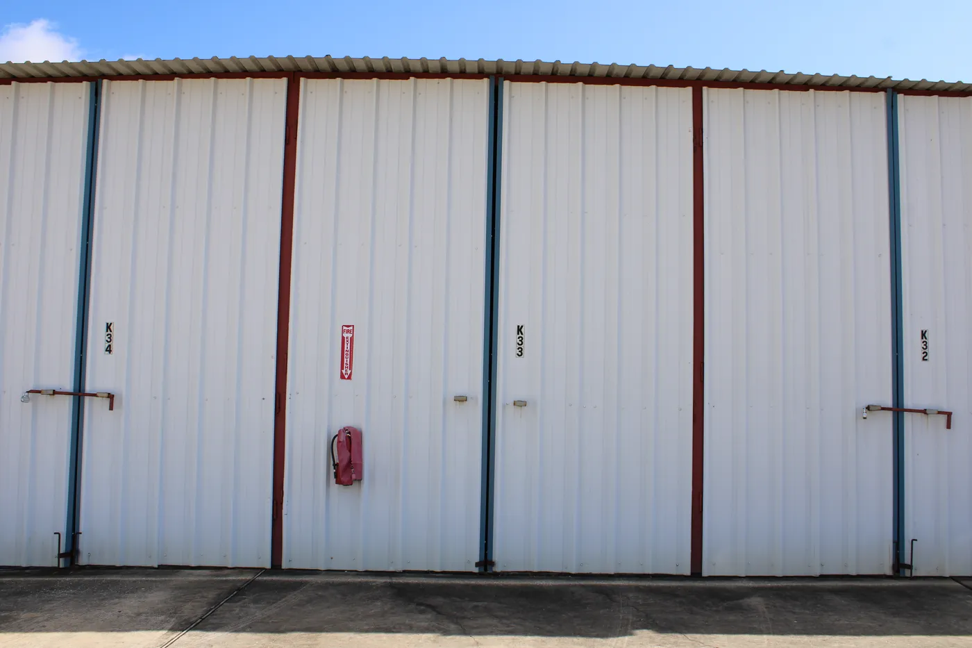 The doors of a 30′ × 11′ enclosed dry storage stall at The Palms Marina