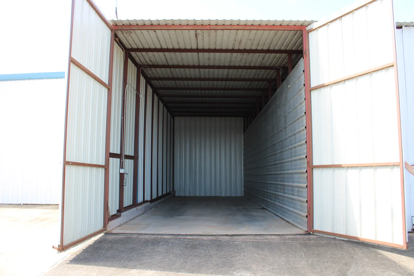 Inside a 45′ × 14′ enclosed dry storage stall at The Palms Marina
