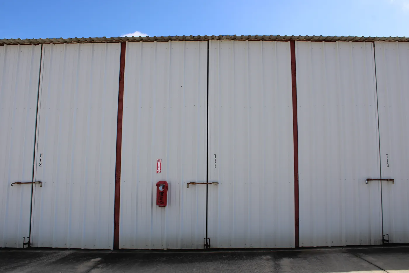 The doors of a 37′ × 12′ enclosed dry storage stall at The Palms Marina