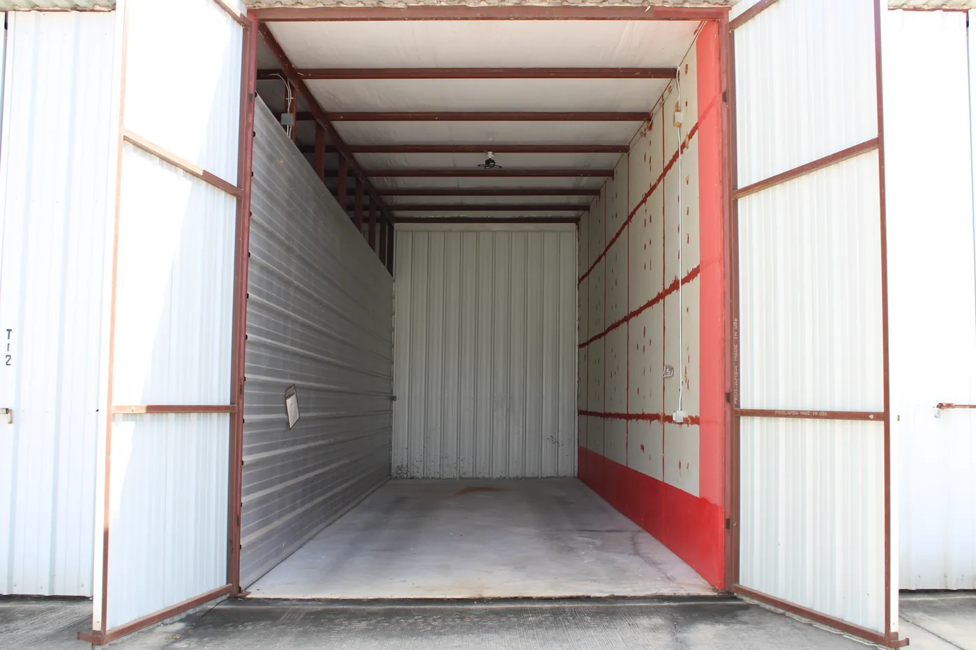 Inside a 37′ × 12′ enclosed dry storage stall at The Palms Marina