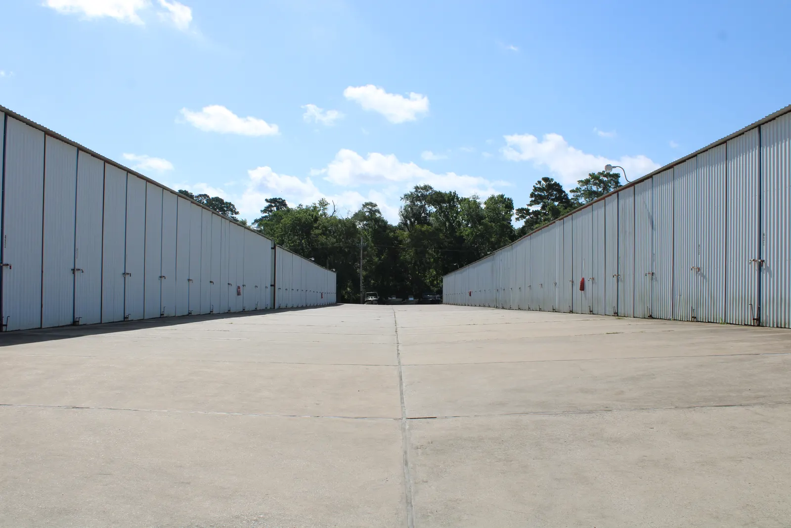 Rows of enclosed dry storage stalls at The Palms Marina